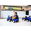 FALK Odrážadlo traktor Baby New Holland T7 s vozíkom a lopatou s hrabľami